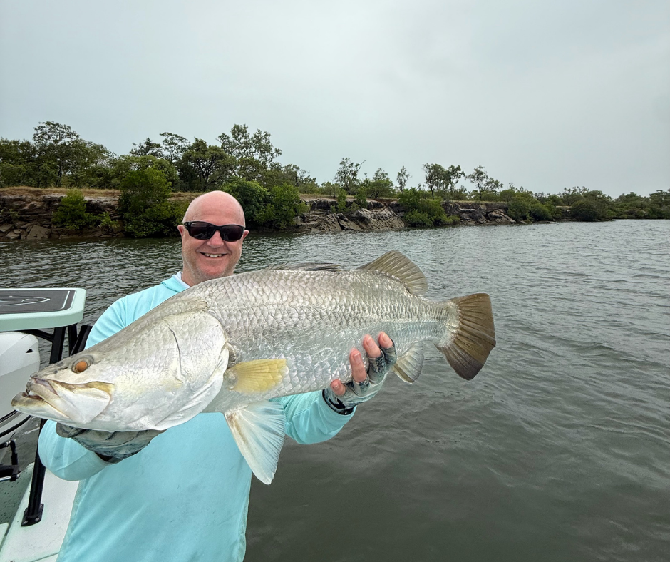 Cairns Tackle World Manger Rob Erskine with one of several quality barramundis caught in the Gulf last week.